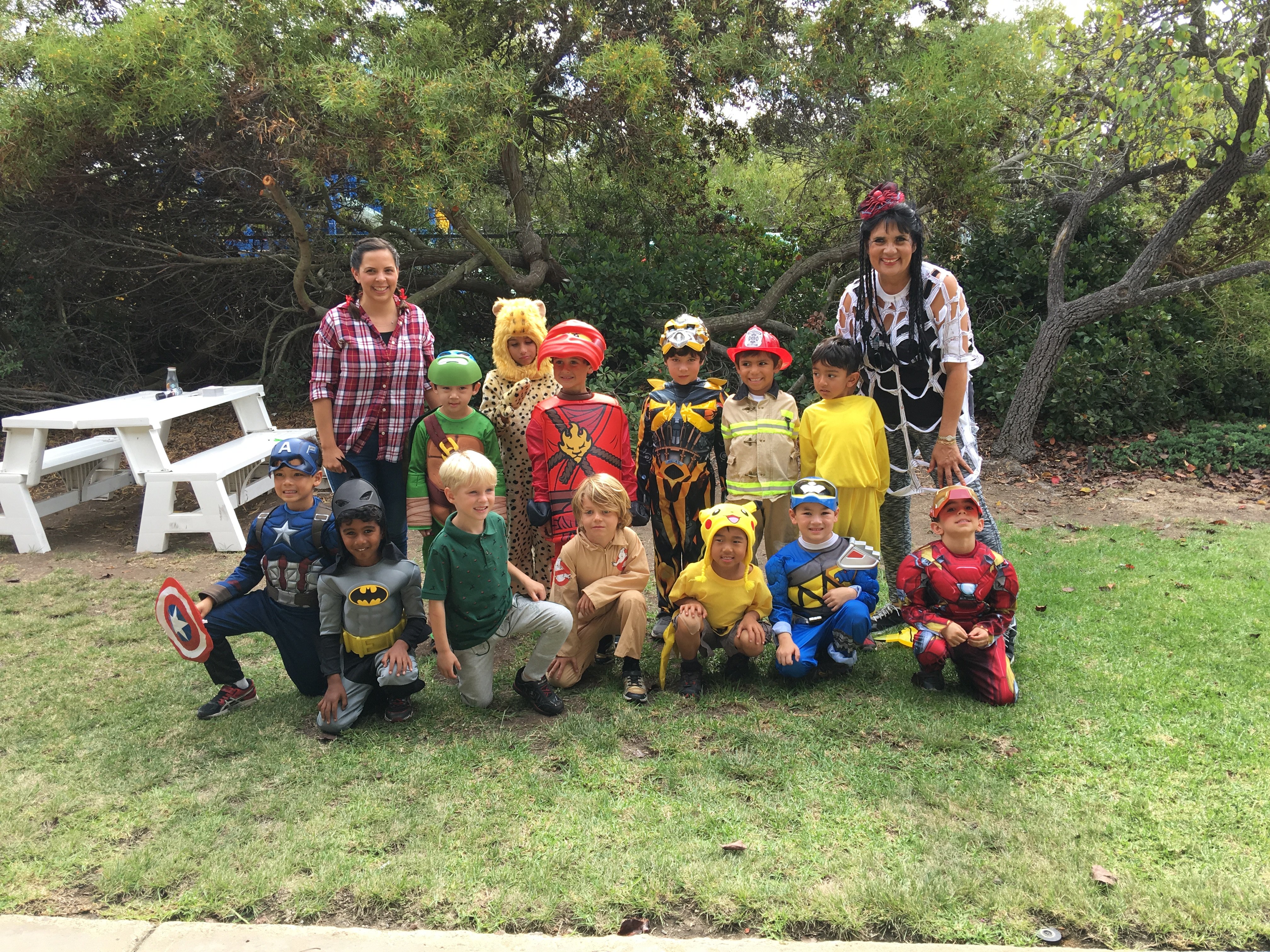 Students in costumes at an MBMA Halloween event
